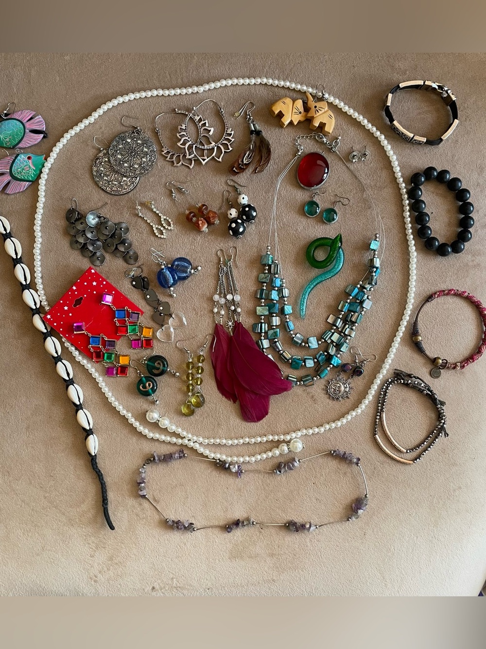 Lot of mix fashion jewelry in winter themed tin box .